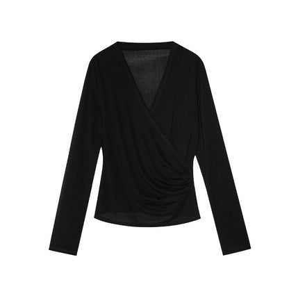 Spring French age-reducing cross V-neck long-sleeved irregular hem bottoming shirt