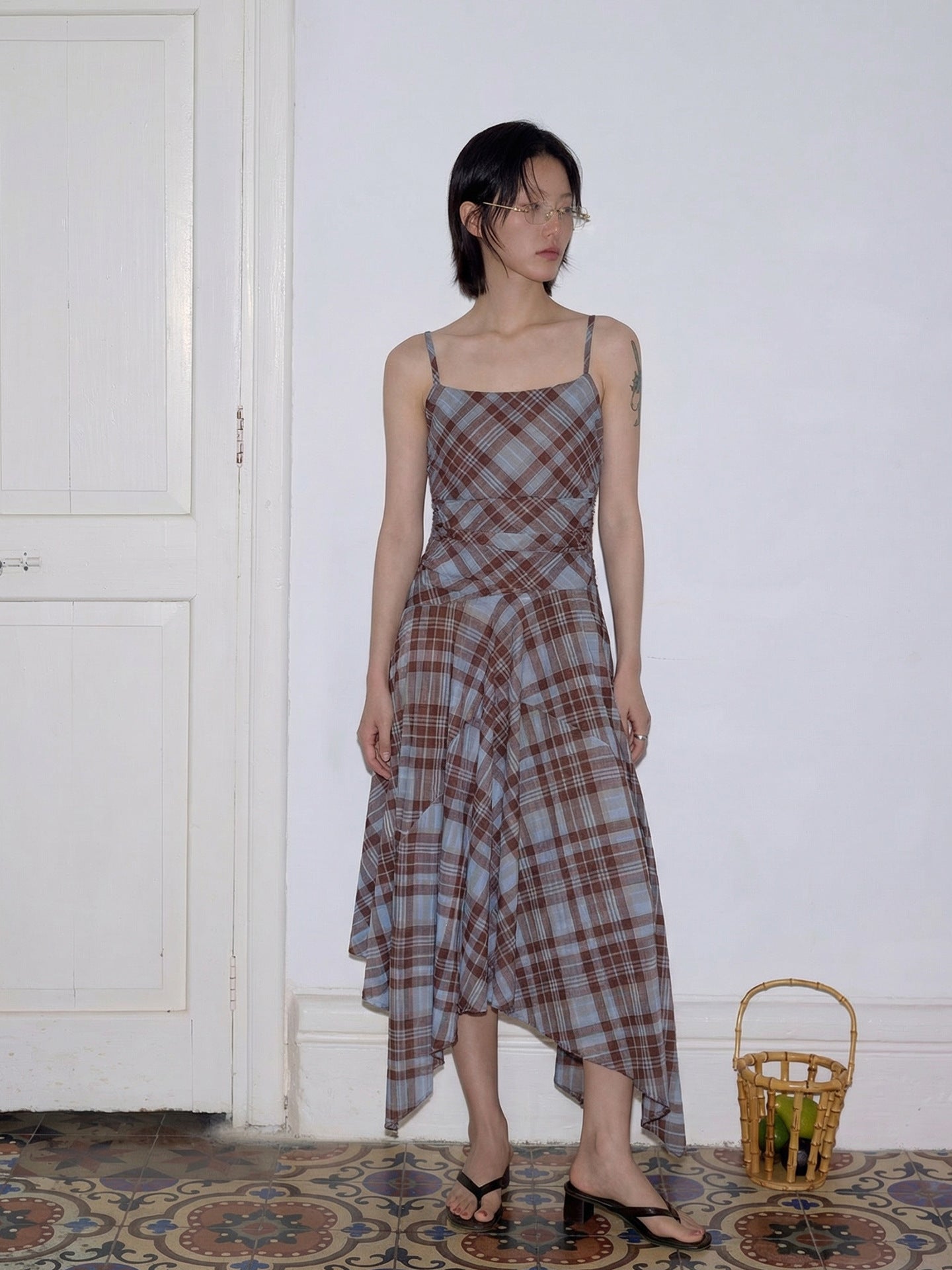 Irregularly deconstructed plaid suspender dress