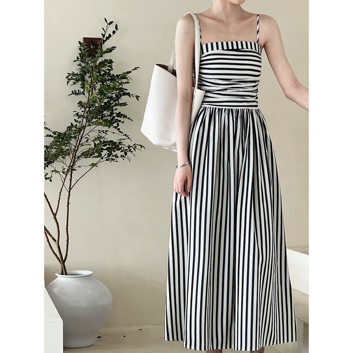 French striped tube top suspender dress for women's high-end off-the-shoulder pleated waist A-word long dress summer