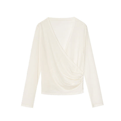 Spring French age-reducing cross V-neck long-sleeved irregular hem bottoming shirt