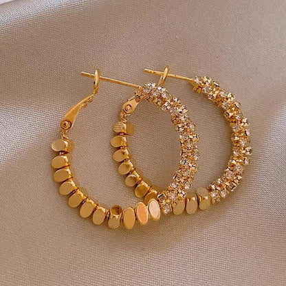Broken silver unique circle earrings women's niche light luxury design ear buckle 2024 new popular high-end earrings