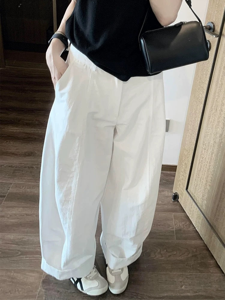Minimalist white scimitar slacks